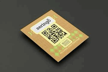 Green cardstock box containing white, beige, and brown cards.